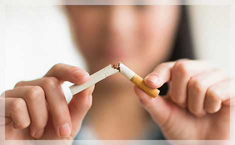 Woman Breaking Cigarette Woman Breaking Cigarette