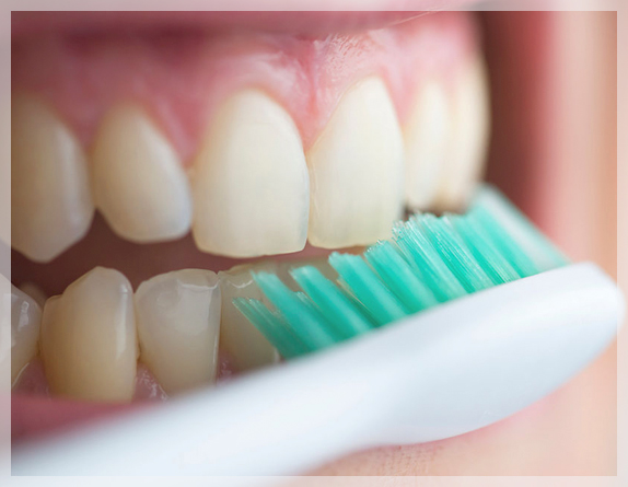Woman brushing teeth Woman brushing teeth