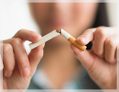 Woman Breaking Cigarette Woman Breaking Cigarette